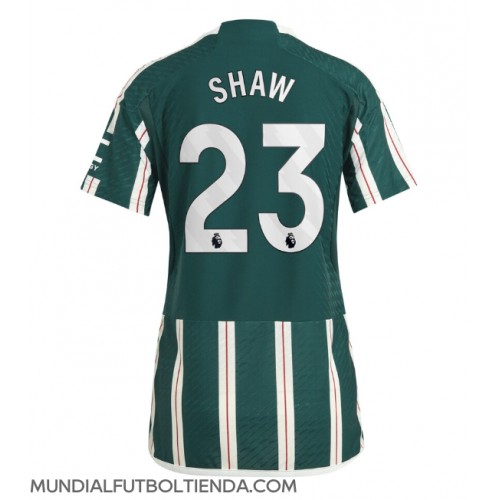 Camiseta Manchester United Luke Shaw #23 Segunda Equipación Replica 2023-24 para mujer mangas cortas